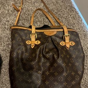 Used but a great working purse. bought as a push gift but not really used much